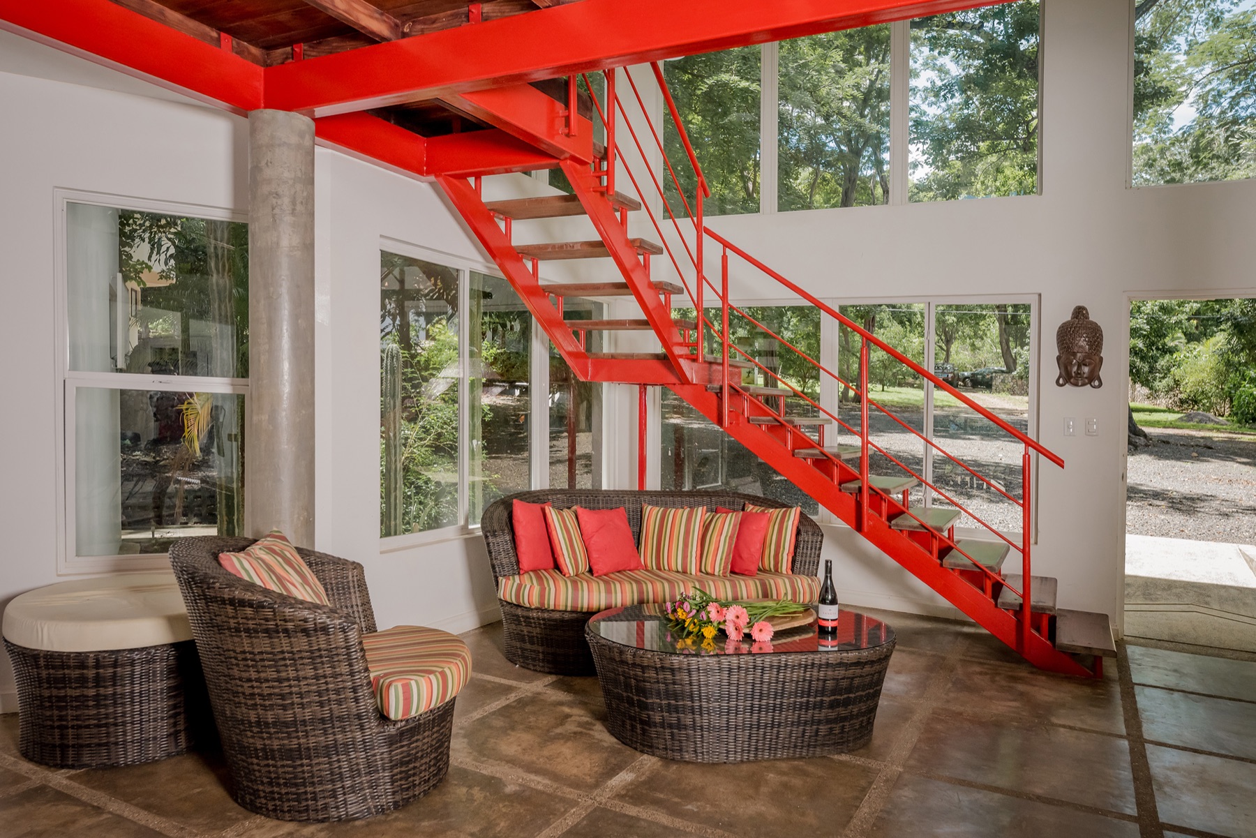 Living area and red staircase